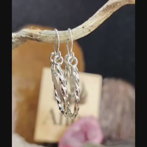 Argollas enroscadas con corazón