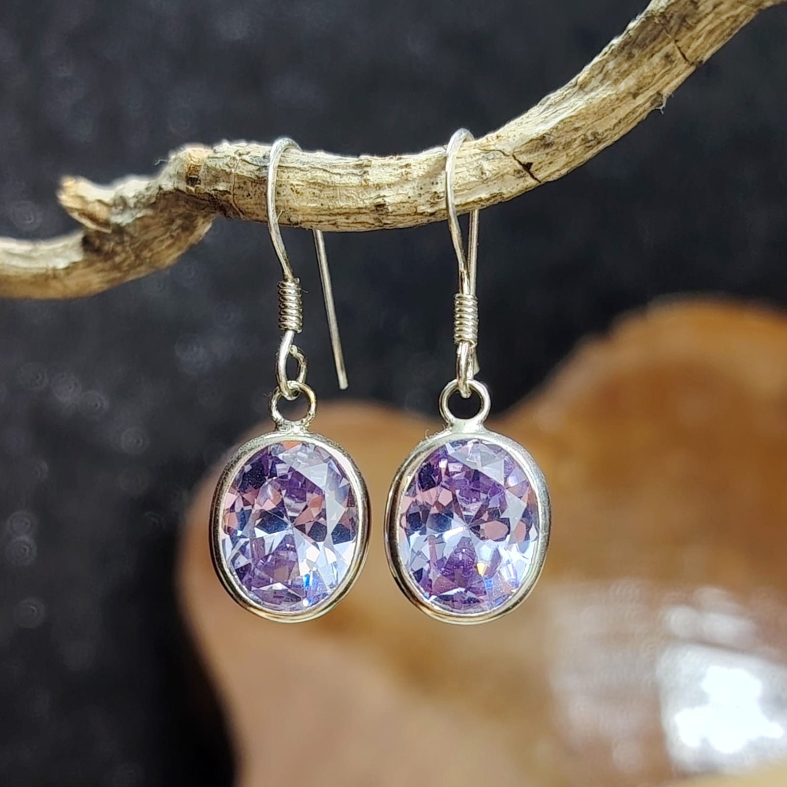 Aros semi largos con cristal amatista claro