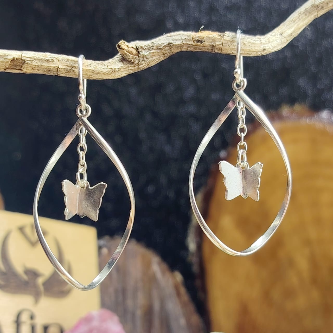 aros largos con chiche móvil de mariposa