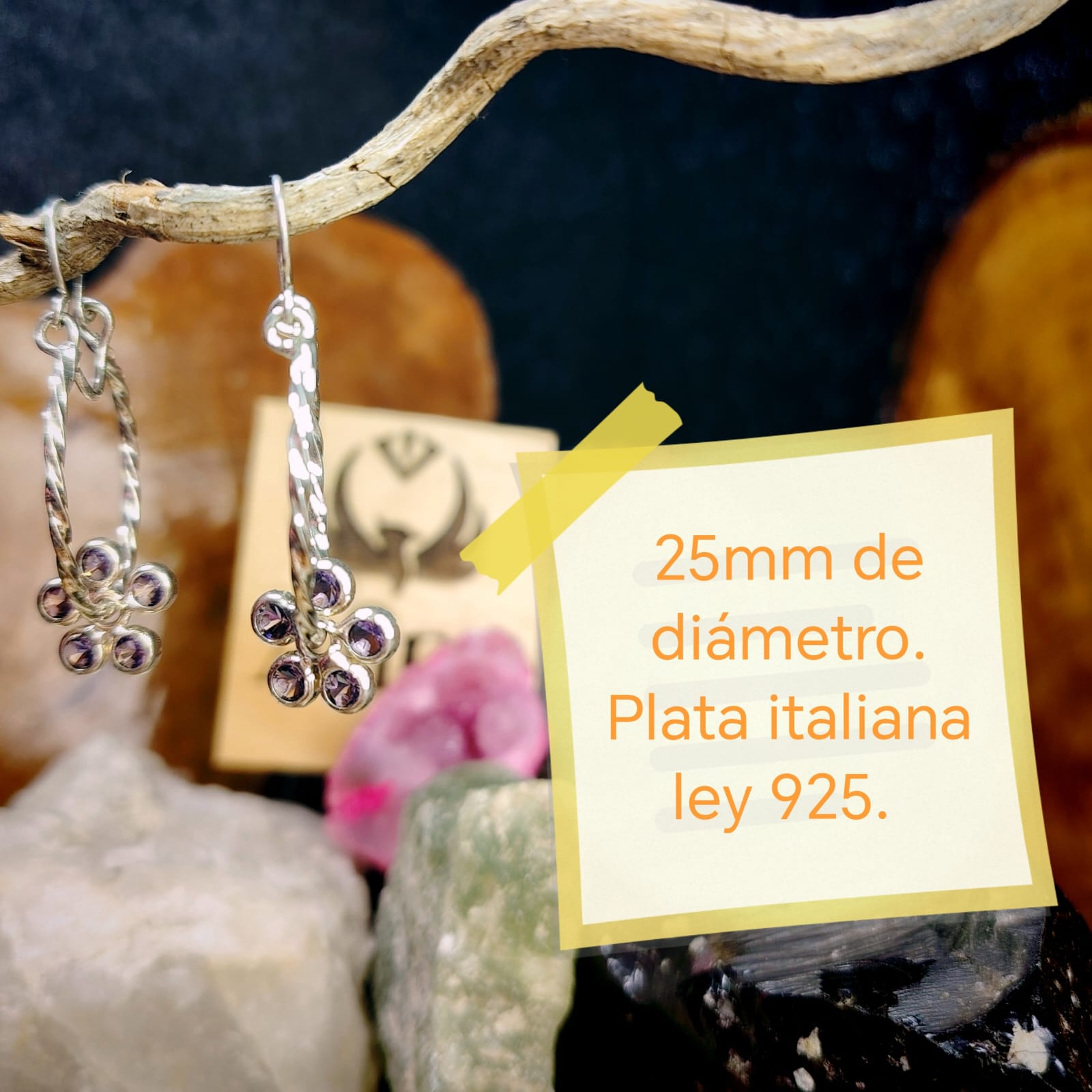 Argollas enroscadas con chiche flor con cristal morado