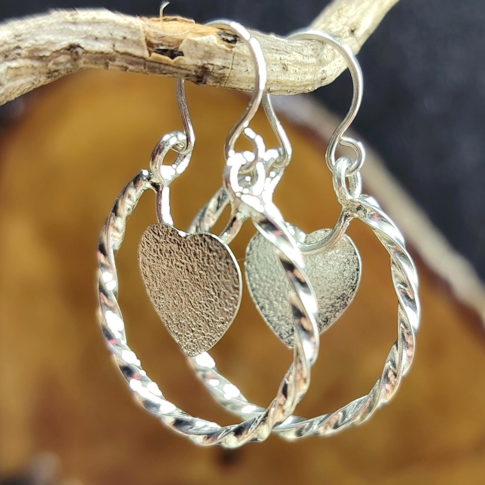 Argollas enroscadas con corazón