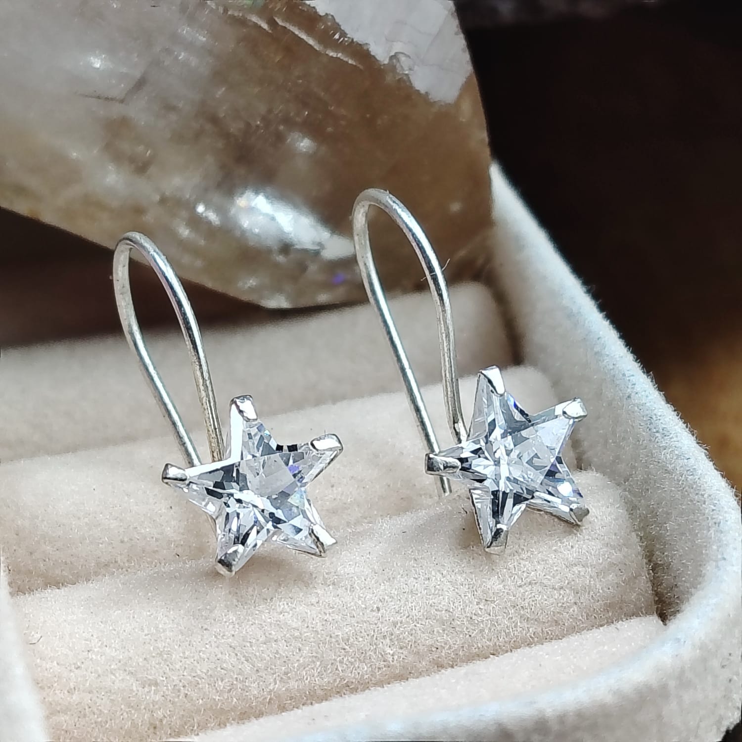 Aros estrellas con cristal translucido cierre completo