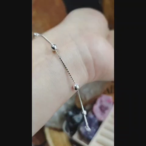 Pulsera con balines de plata
