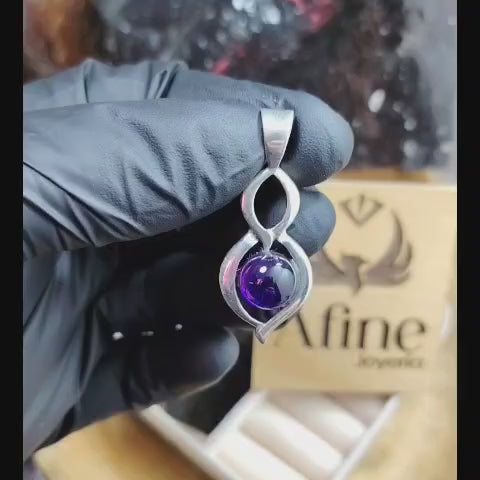 Dije con piedra amatista