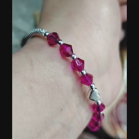 Pulsera cuencas de cristales rosados mas corazón