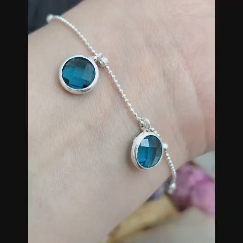 Pulsera con cristales móviles forma circulares color calipso