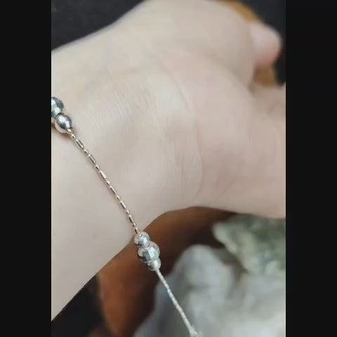 Pulsera con balines de plata