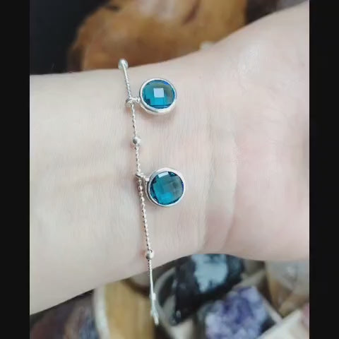 Pulsera con cristales móviles forma circulares color calipso