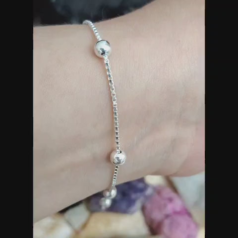 Pulsera con balines de plata