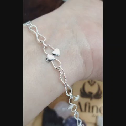 Pulsera diseño de infinitos y corazones