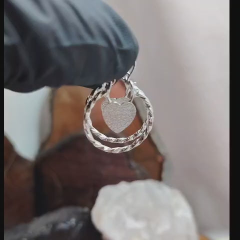 Argollas enroscadas con corazón