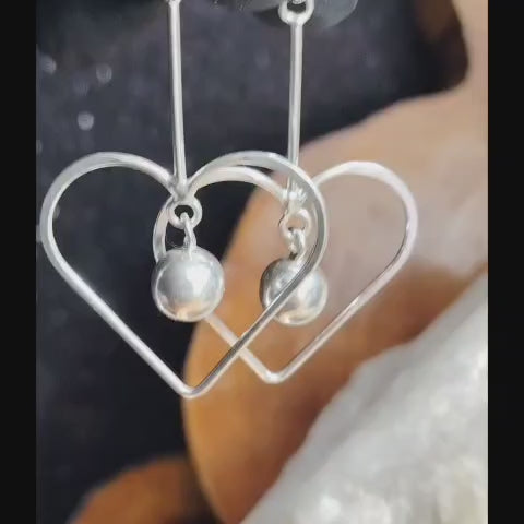 Aros largos de corazones mas esferas