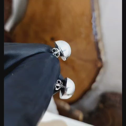 Aros pegados mitad de esferas